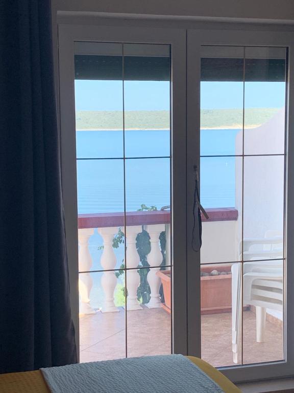 Posteľ alebo postele v izbe v ubytovaní Villa M Studio Apartment