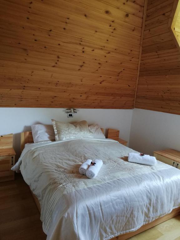 Postel nebo postele na pokoji v ubytování Casa Ninfea Panzió