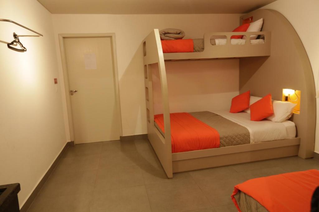 Postel nebo postele na pokoji v ubytování Concept Design Hostel & Suites