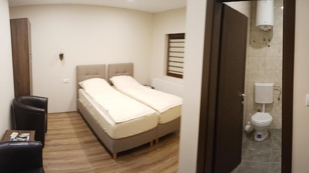Postel nebo postele na pokoji v ubytování Hacijenda