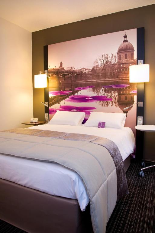 Postel nebo postele na pokoji v ubytování Mercure Toulouse Centre Wilson Capitole