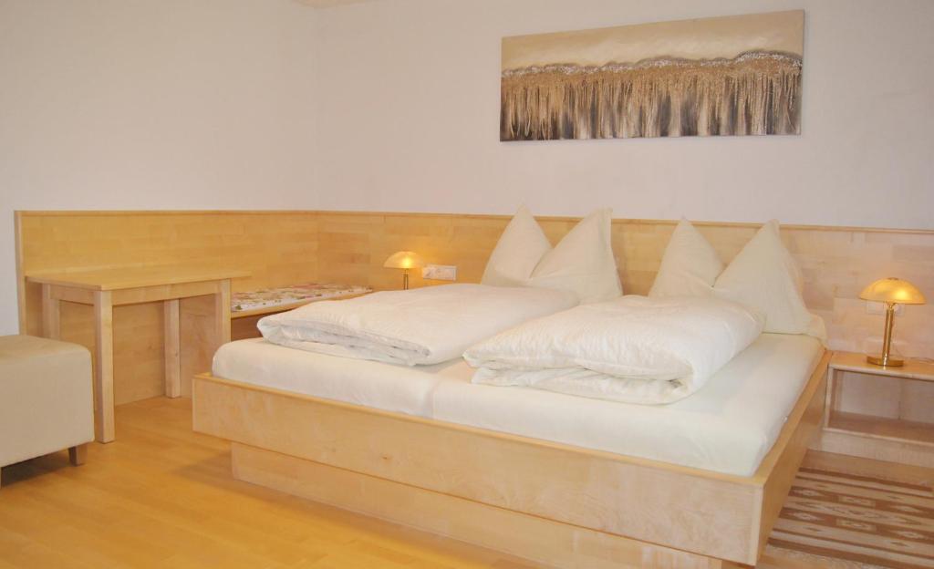 Postel nebo postele na pokoji v ubytování Haus Bergfriede