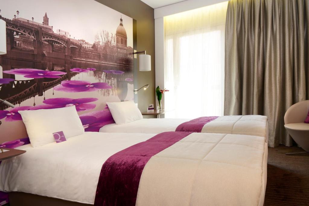Postel nebo postele na pokoji v ubytování Mercure Toulouse Centre Wilson Capitole