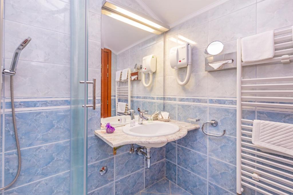 Koupelna v ubytování Hotel Ostrea