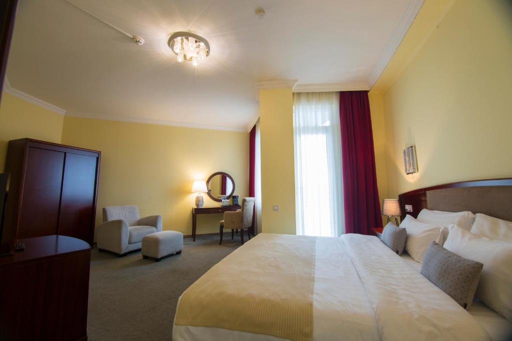 Postel nebo postele na pokoji v ubytování Hotel Aisi