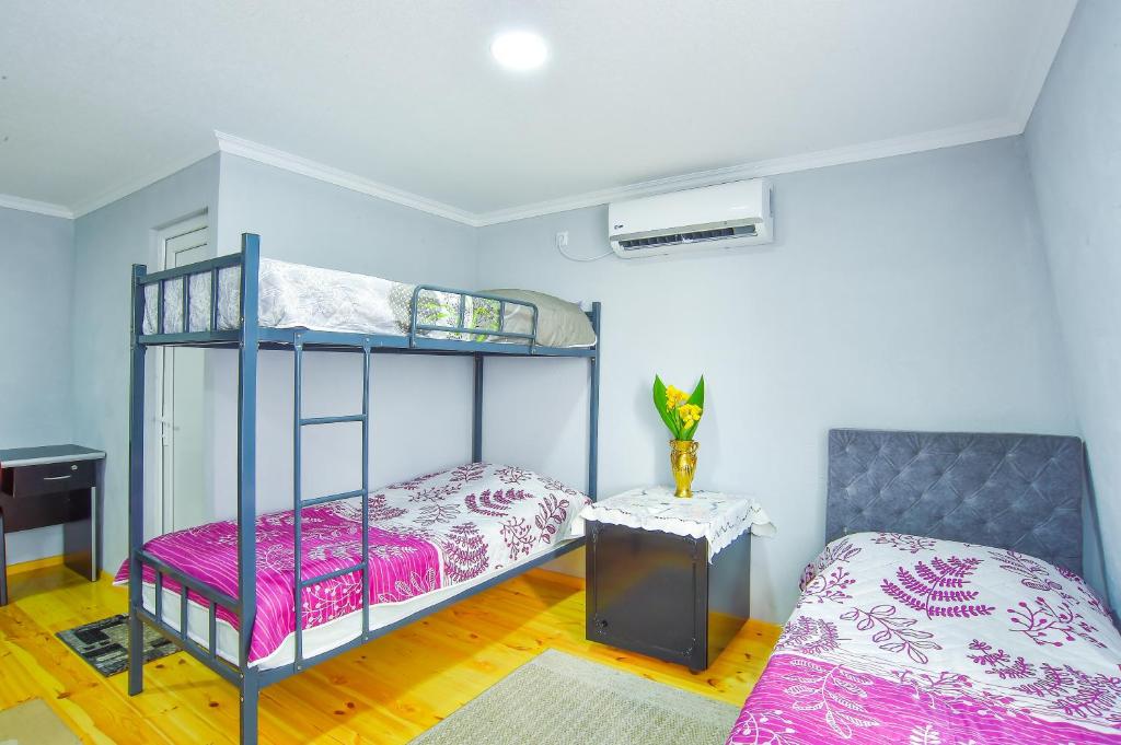 Postel nebo postele na pokoji v ubytování Hotel 9th Sky