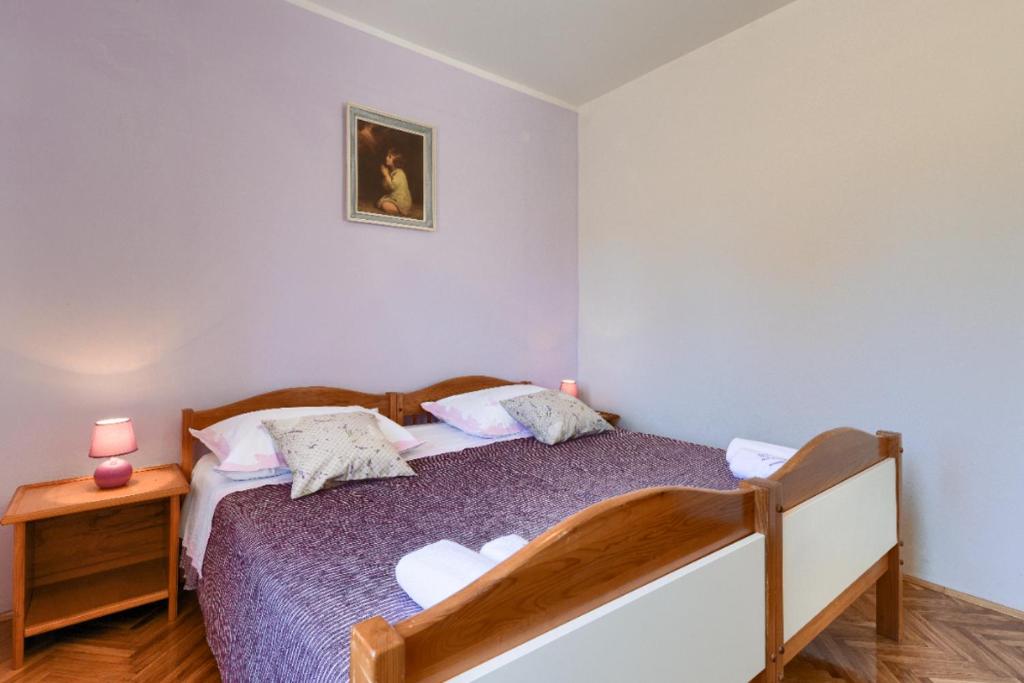 Postel nebo postele na pokoji v ubytování Apartment Marija
