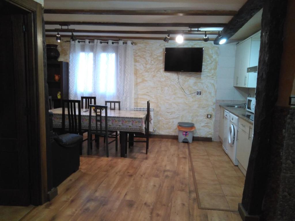 A kitchen or kitchenette at Apartamentos Turisticos Julia