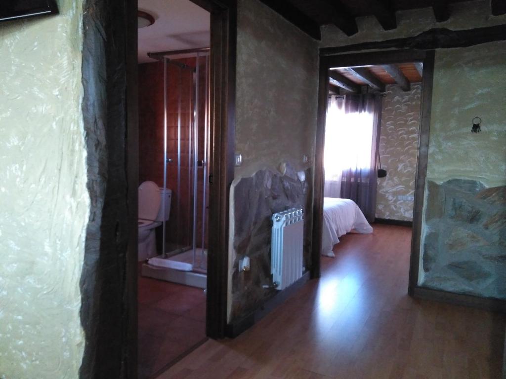 A bed or beds in a room at Apartamentos Turisticos Julia