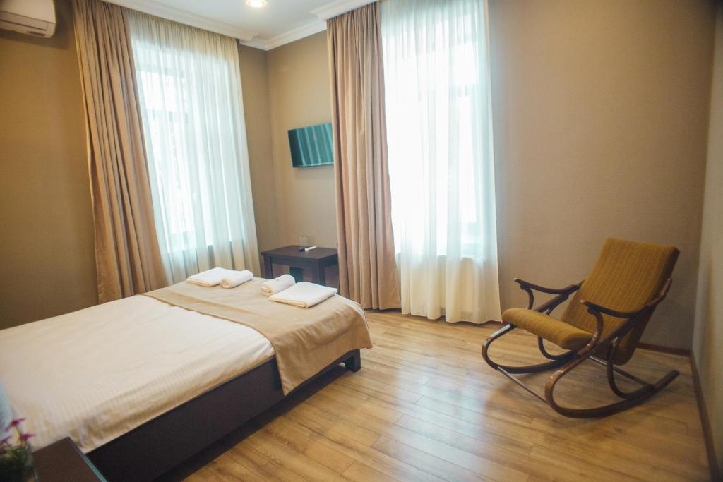 Voodi või voodid majutusasutuse Hotel Almi toas