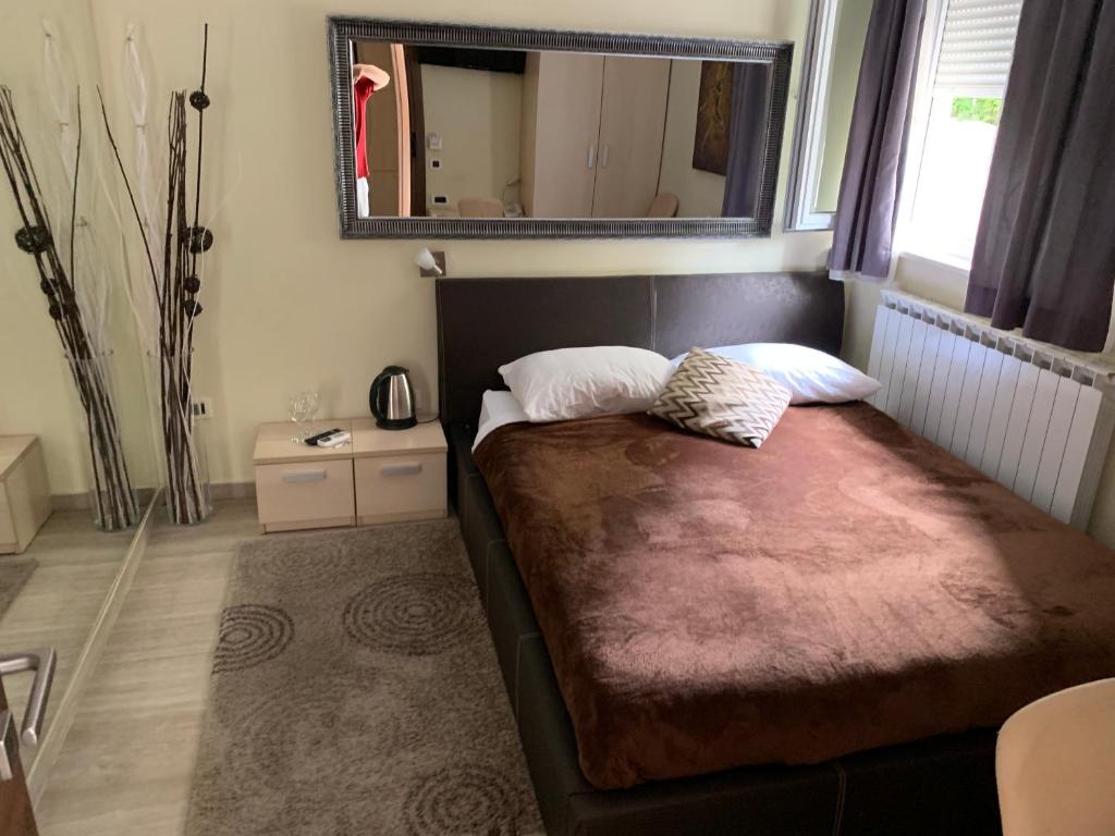 Posteľ alebo postele v izbe v ubytovaní Enter Rooms