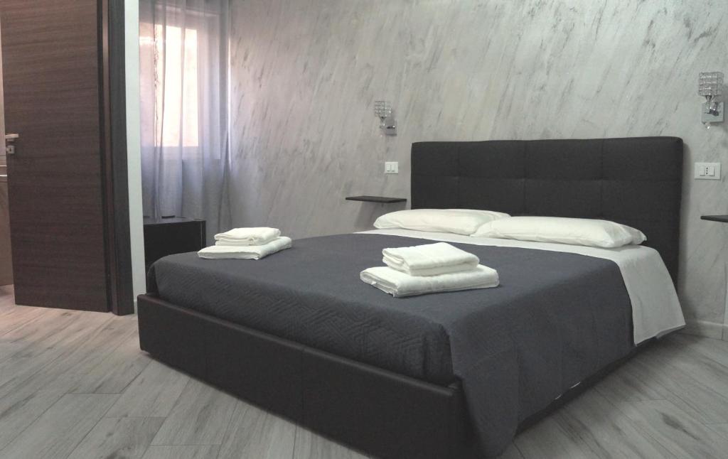 Postel nebo postele na pokoji v ubytování B&B Agrigento da Tony Palermo