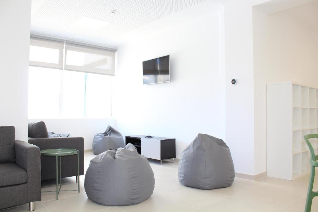 TV a/nebo společenská místnost v ubytování Dunas Hostel & Guesthouse