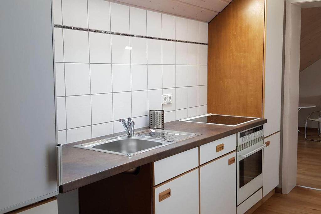 Kuchyň nebo kuchyňský kout v ubytování Apartment Kern Lautrach