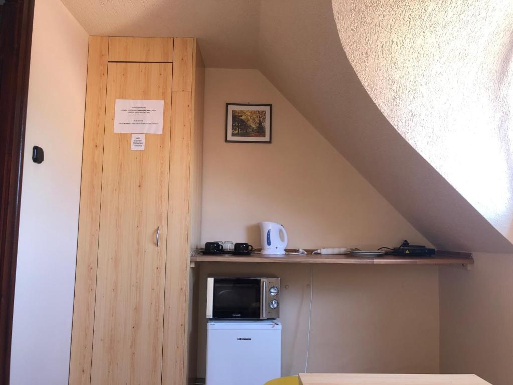 Kuchyň nebo kuchyňský kout v ubytování Óvár 12 Vendégház