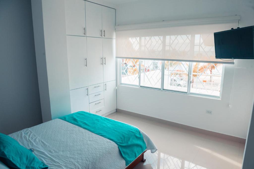 Postel nebo postele na pokoji v ubytování Hotel Casa Arnaldo "Esmeraldas"