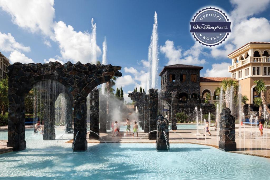 a fountain in a mall with people playing in it at Four Seasons Resort Orlando at Walt Disney World Resort in Orlando