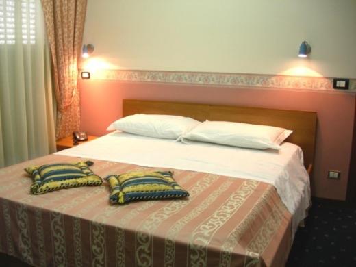 Postel nebo postele na pokoji v ubytování Hotel Valle Verde