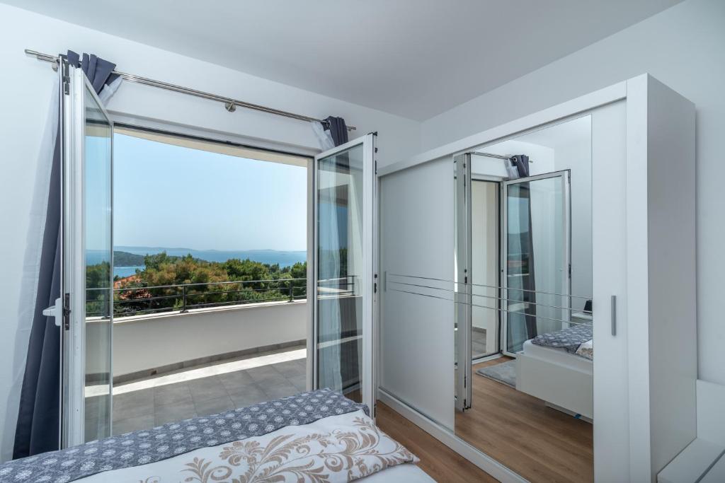 Postel nebo postele na pokoji v ubytování Villa Confido Luxury Apartment 01