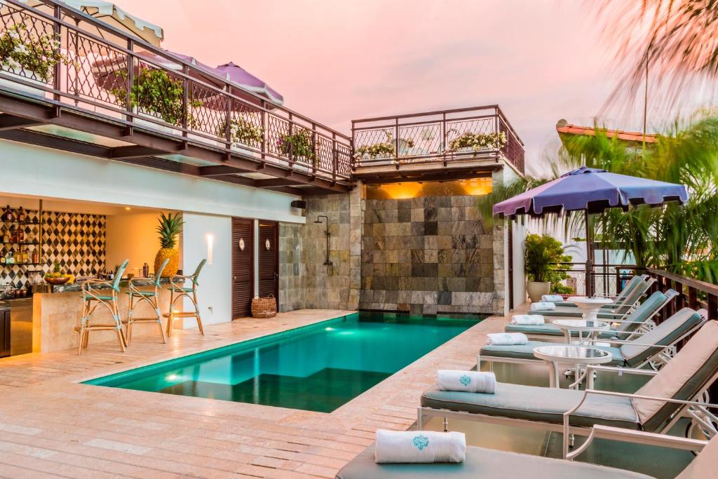 Bazén v ubytování Hotel Capellán de Getsemaní nebo v jeho okolí