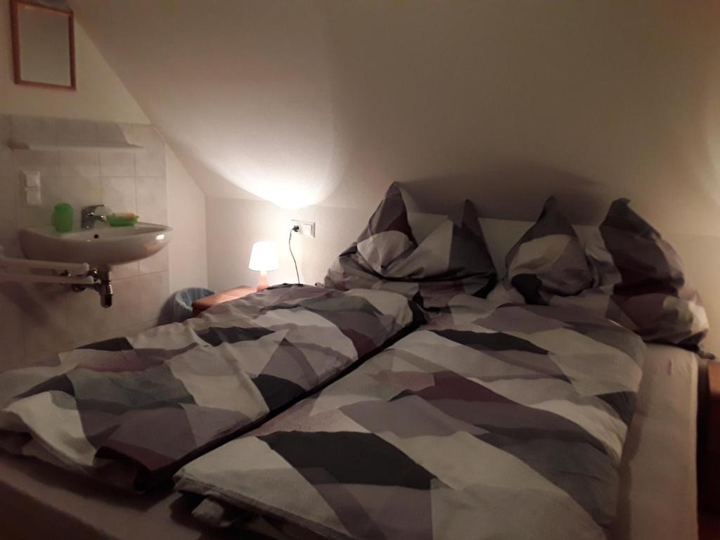 Postel nebo postele na pokoji v ubytování Ferienhaus Bionda