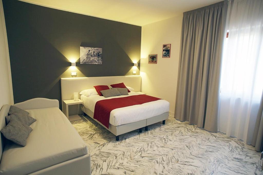 A bed or beds in a room at Mikeme