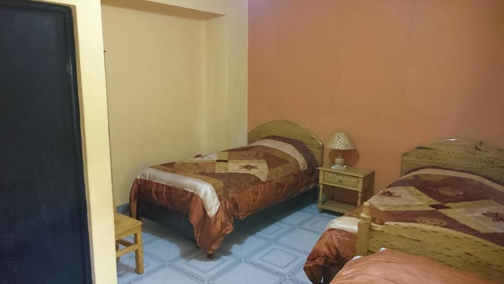Hostal Coronel Pedro Arraya客房内的一张或多张床位