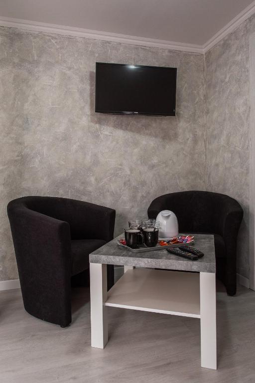 TV a/nebo společenská místnost v ubytování Penzion Bardejov