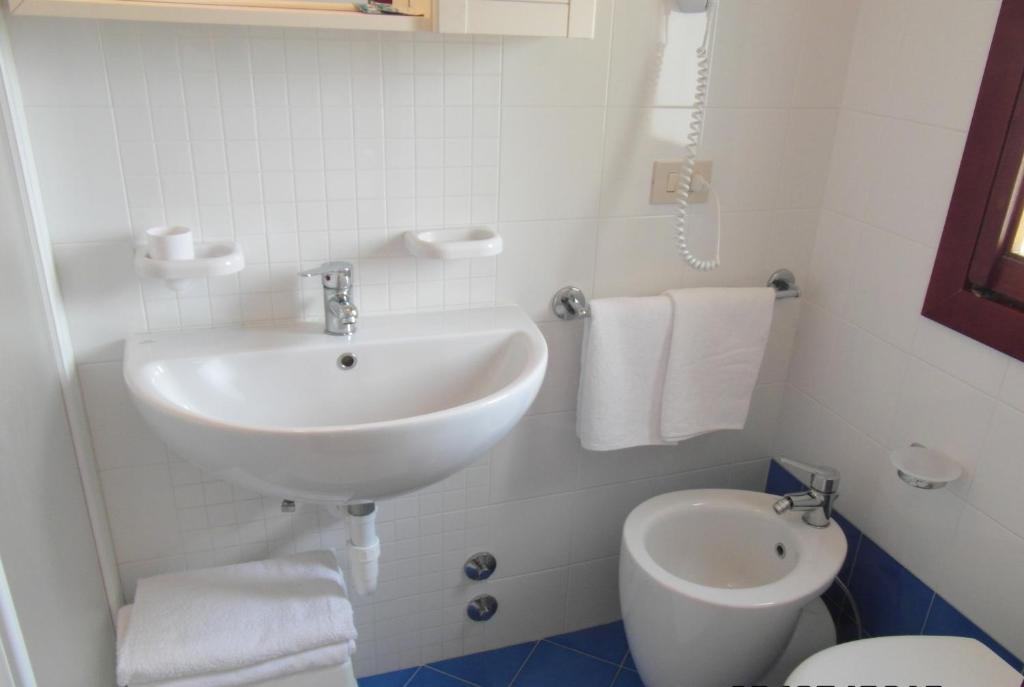 Koupelna v ubytování Hotel Verona