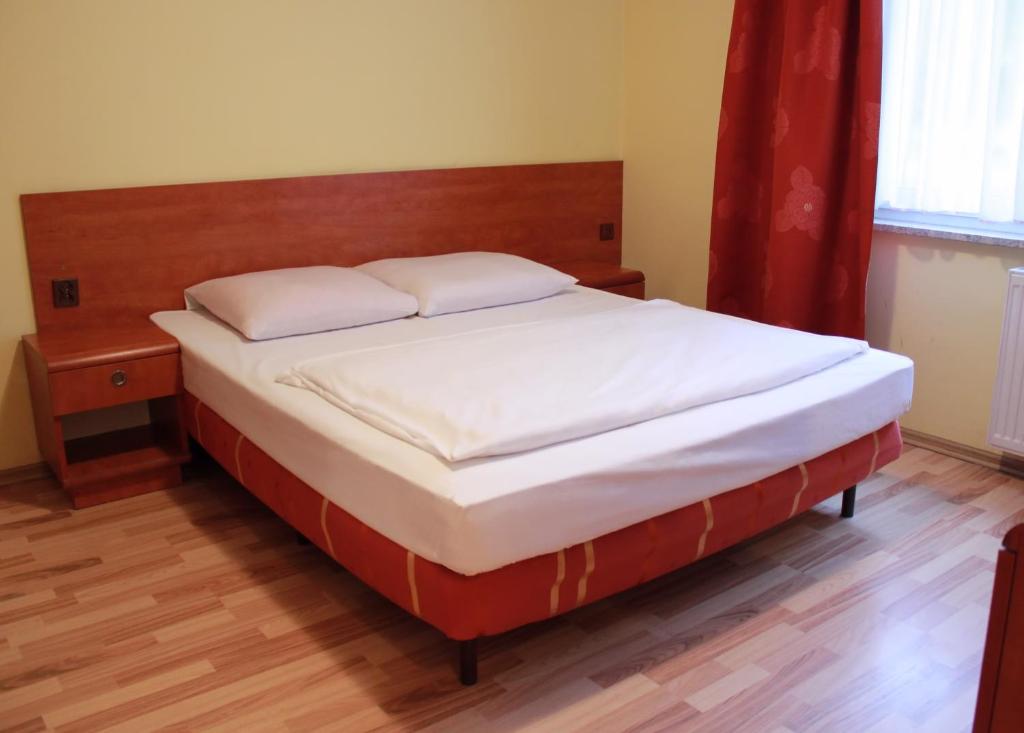 Postel nebo postele na pokoji v ubytování City Hostel