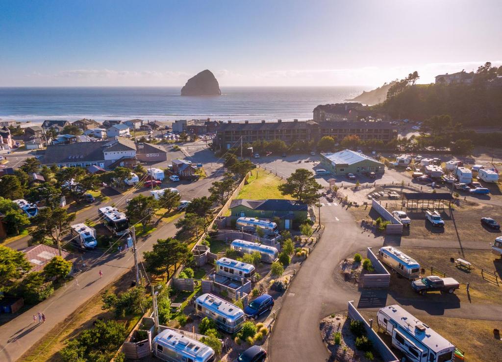 an aerial view of a parking lot next to the ocean at Hart’s Camp Airstream Hotel & RV Park in Pacific City