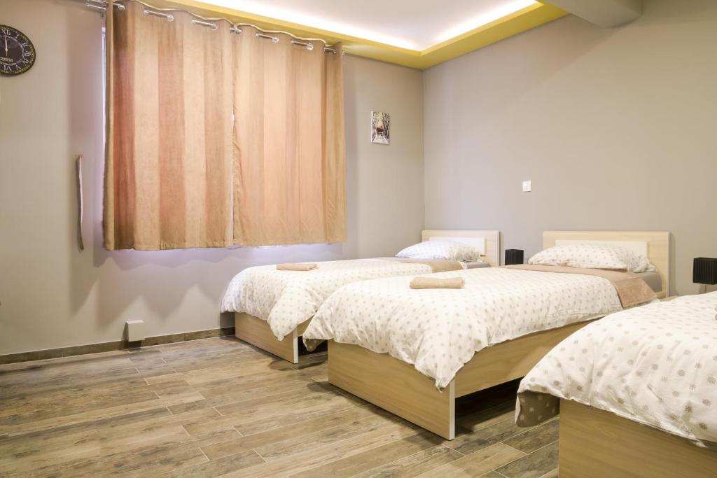 Postel nebo postele na pokoji v ubytování Apartments "Our Place" Sarajevo