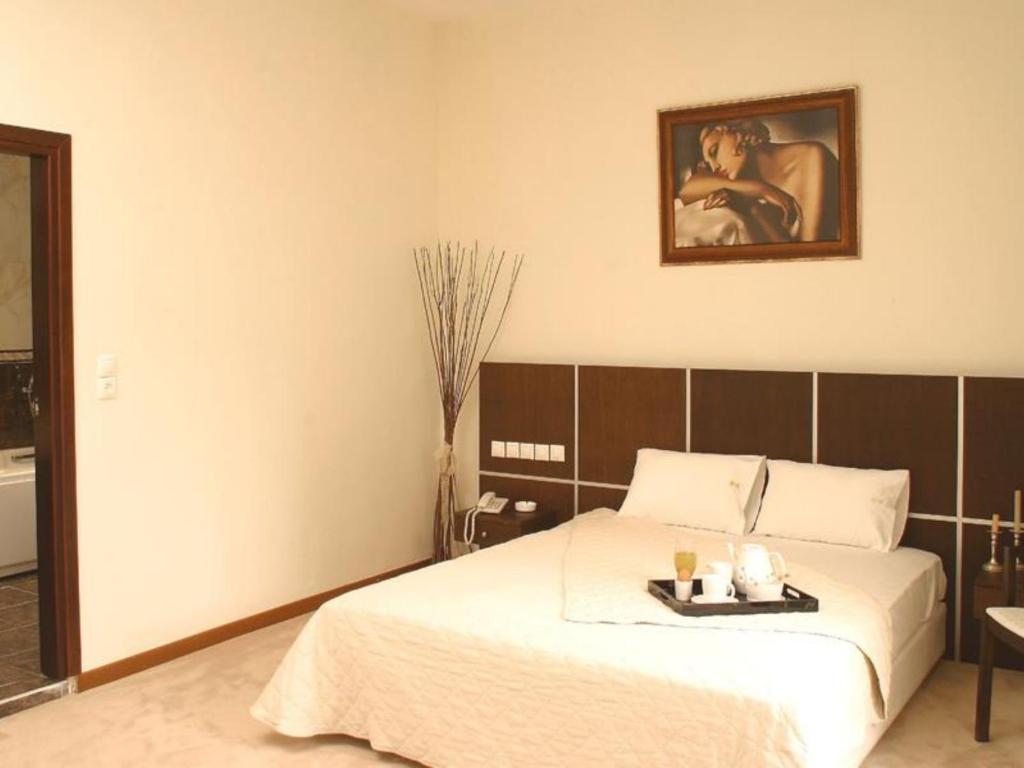 Postel nebo postele na pokoji v ubytování Blue Sea Hotel Alimos