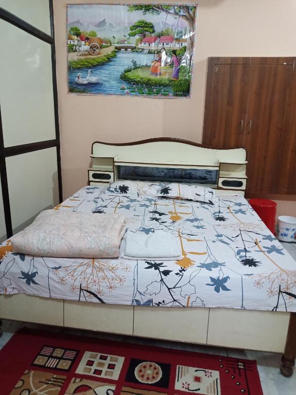 Postel nebo postele na pokoji v ubytování Sunita homestay