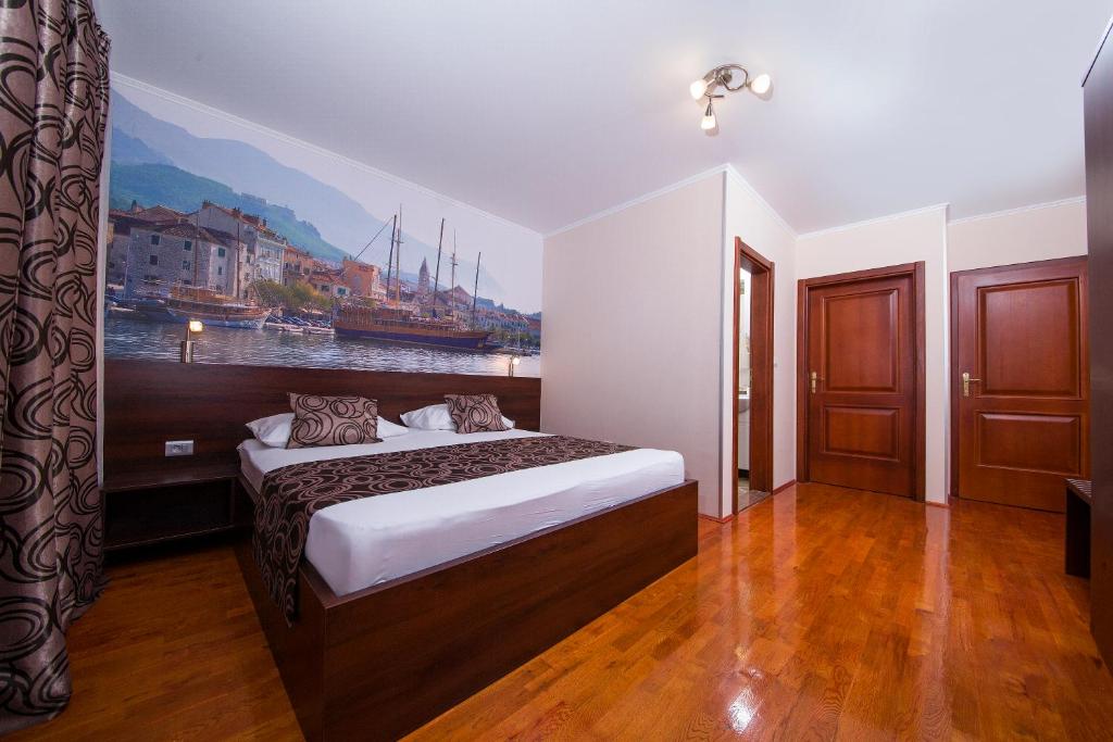 Posteľ alebo postele v izbe v ubytovaní Villa Art