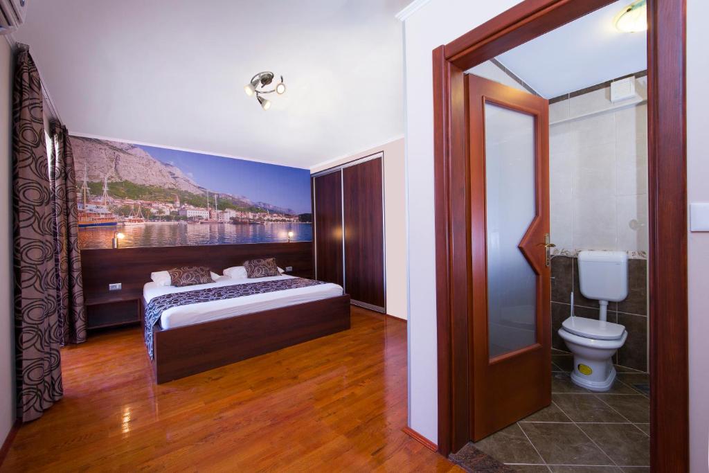 Posteľ alebo postele v izbe v ubytovaní Villa Art