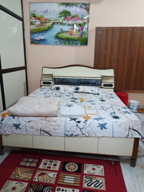 Postel nebo postele na pokoji v ubytování Sunita homestay