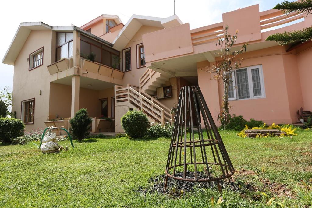 Zahrada ubytování Rainbow Cottages-Budget Friendly rooms