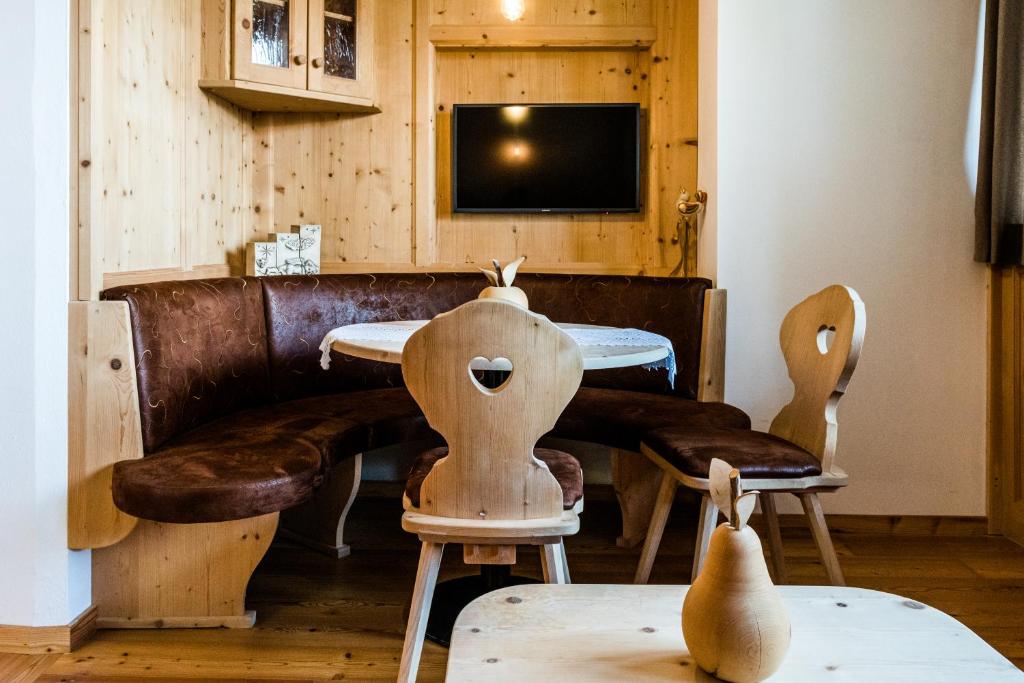 Telewizja i/lub zestaw kina domowego w obiekcie Garni Hotel and Apartments Wildbach