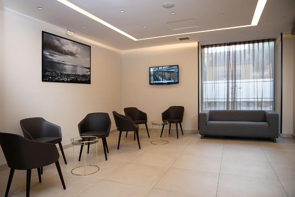 TV a/nebo společenská místnost v ubytování Hotel Palazzo Argenta