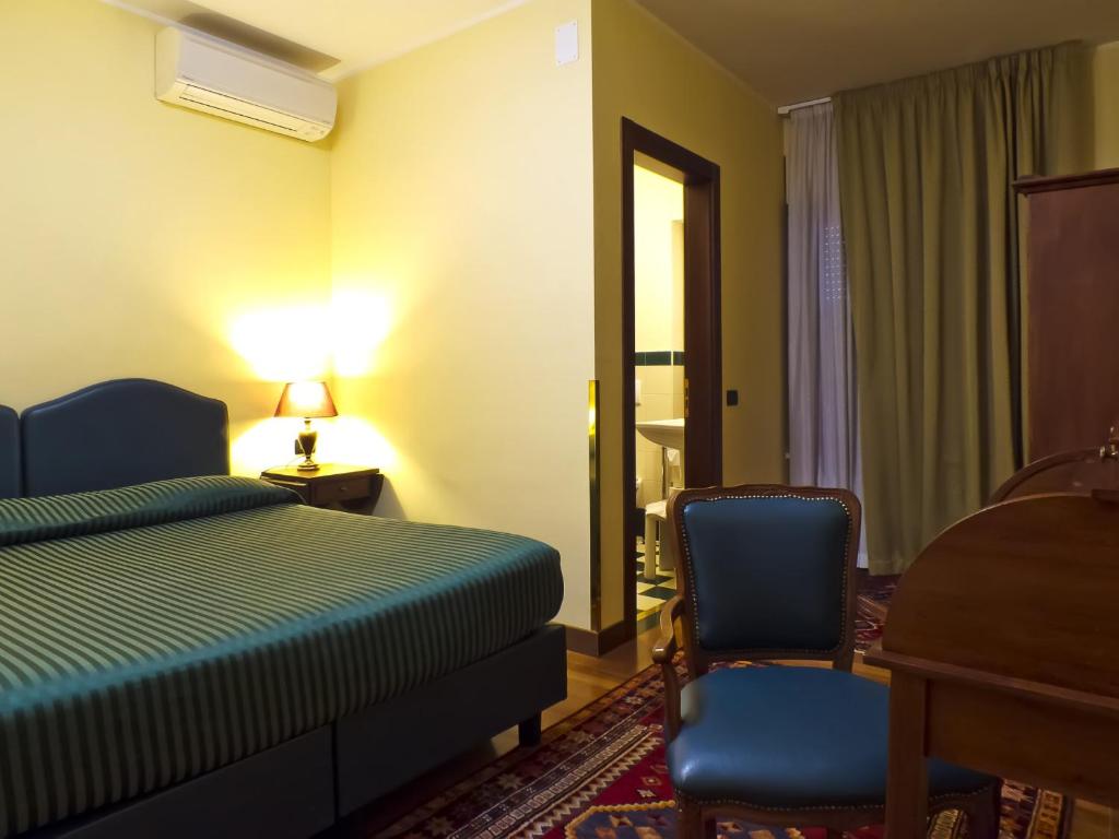 Łóżko lub łóżka w pokoju w obiekcie Relax Style House Central Rooms
