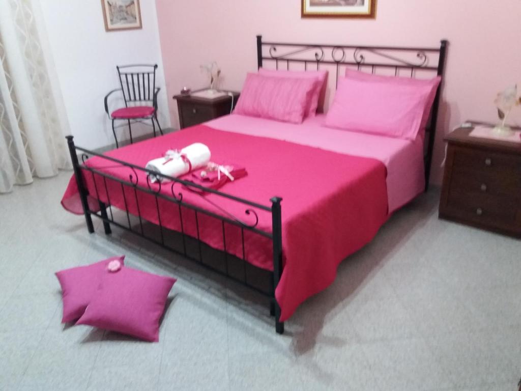 En eller flere senge i et værelse på Casa Vacanze " IL PONTE "