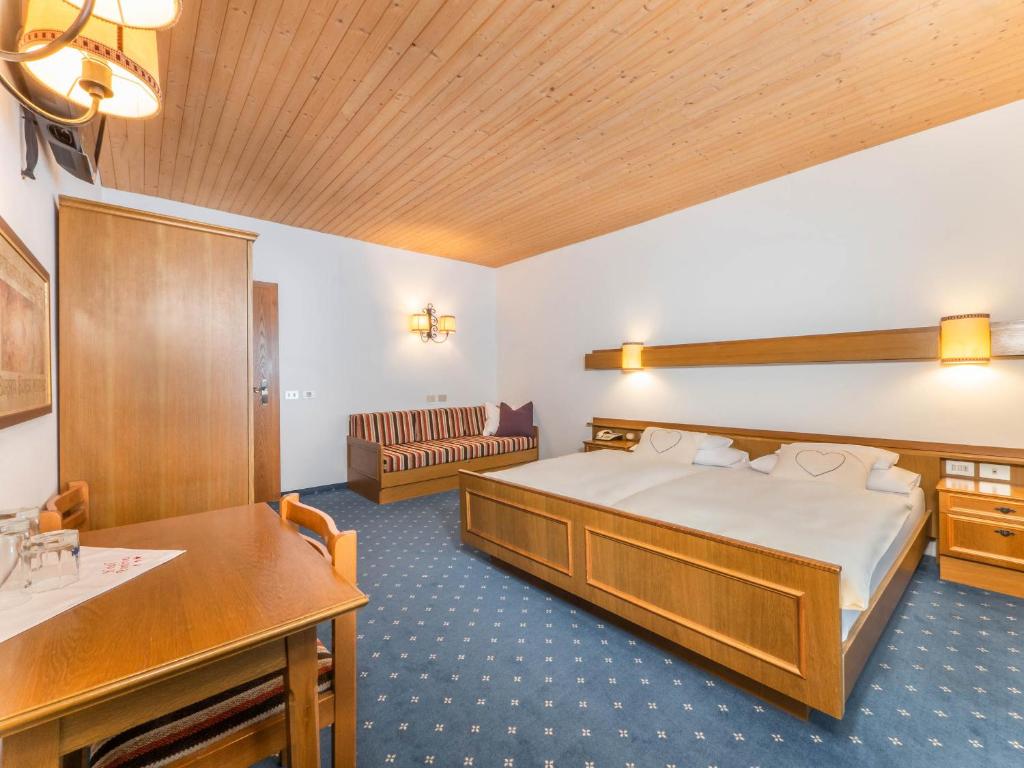Postel nebo postele na pokoji v ubytování Hotel Pontives