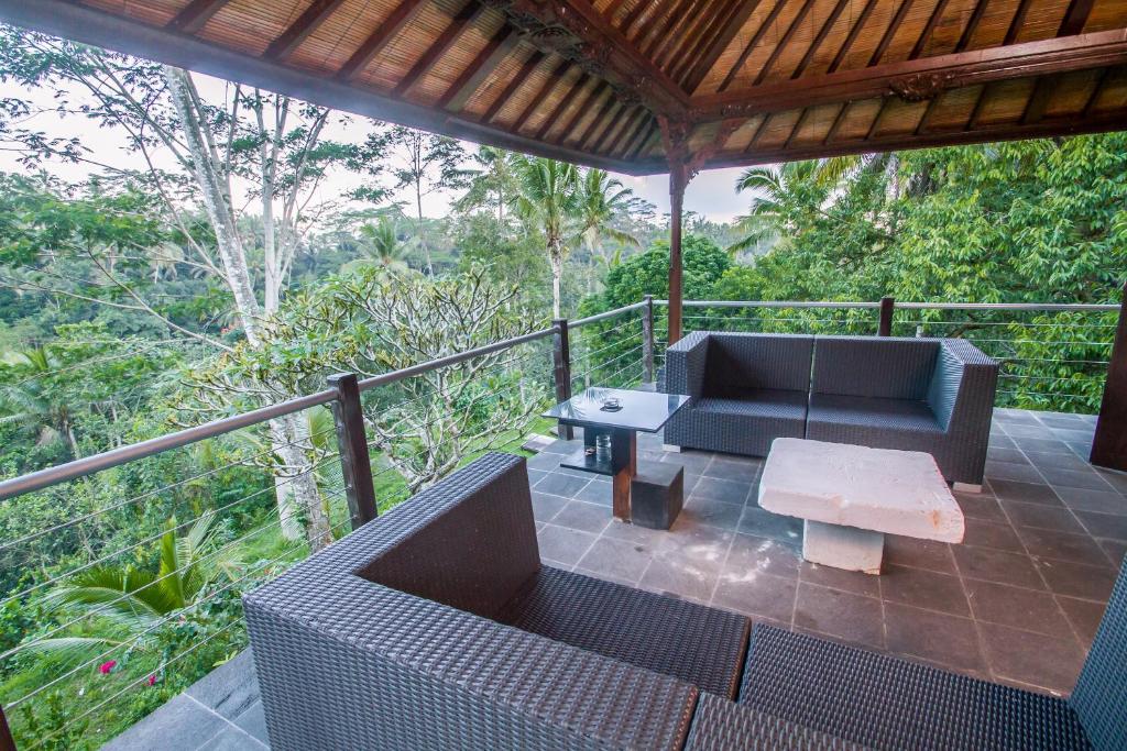 Posezení v ubytování Puri Saron Hotel Madangan - Gianyar