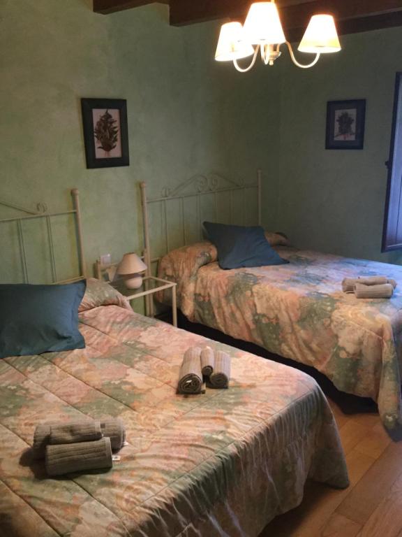 Posteľ alebo postele v izbe v ubytovaní Casa Rural Reserva Saja-Besaya