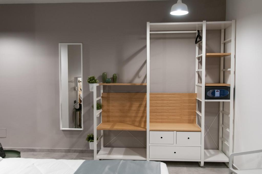Postel nebo postele na pokoji v ubytování Residence Hotel Moderno