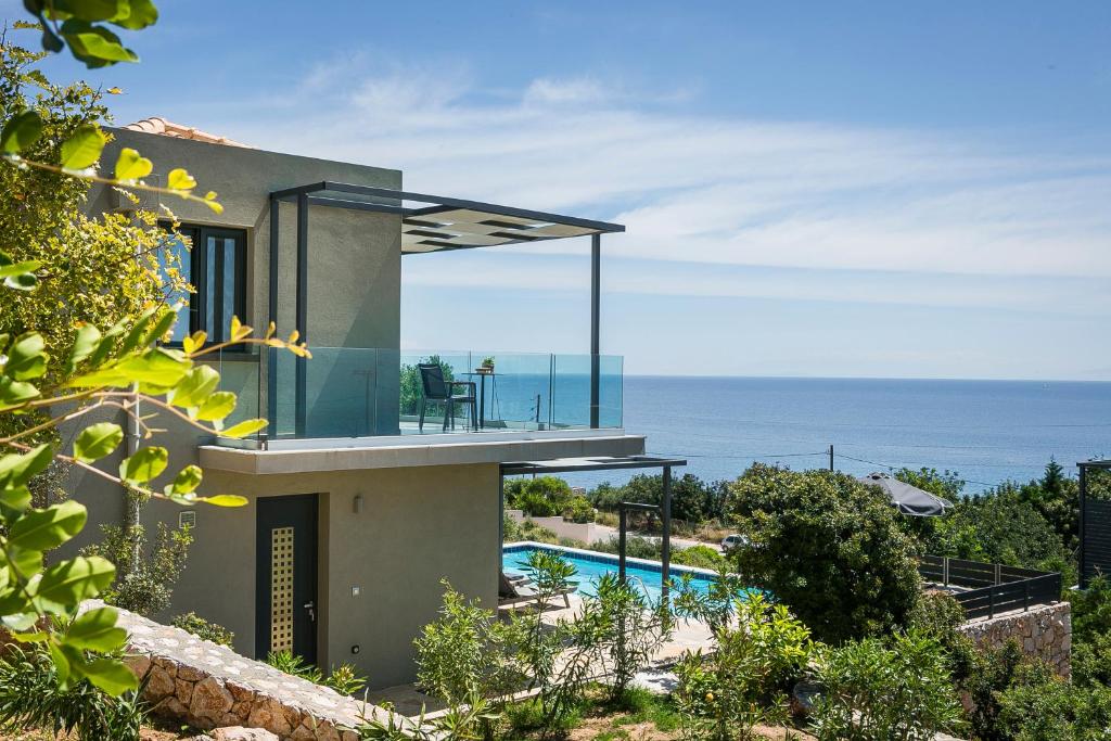 a house with a view of the ocean at Villa Blue Sea in Skala
