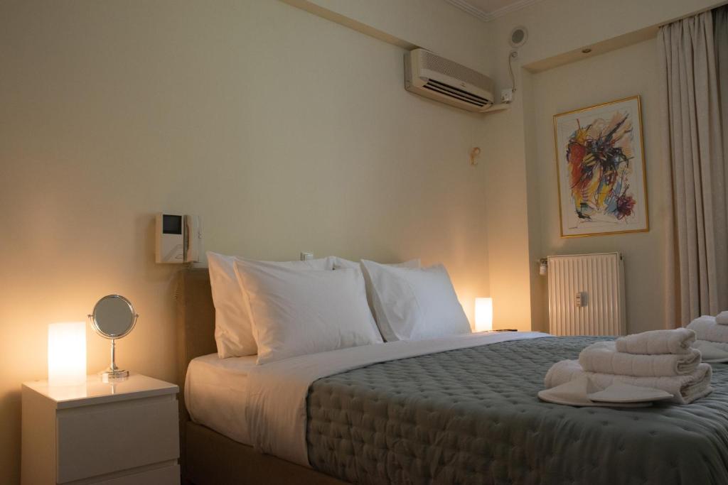En eller flere senger på et rom på Luxurious Apartment in Central Athens