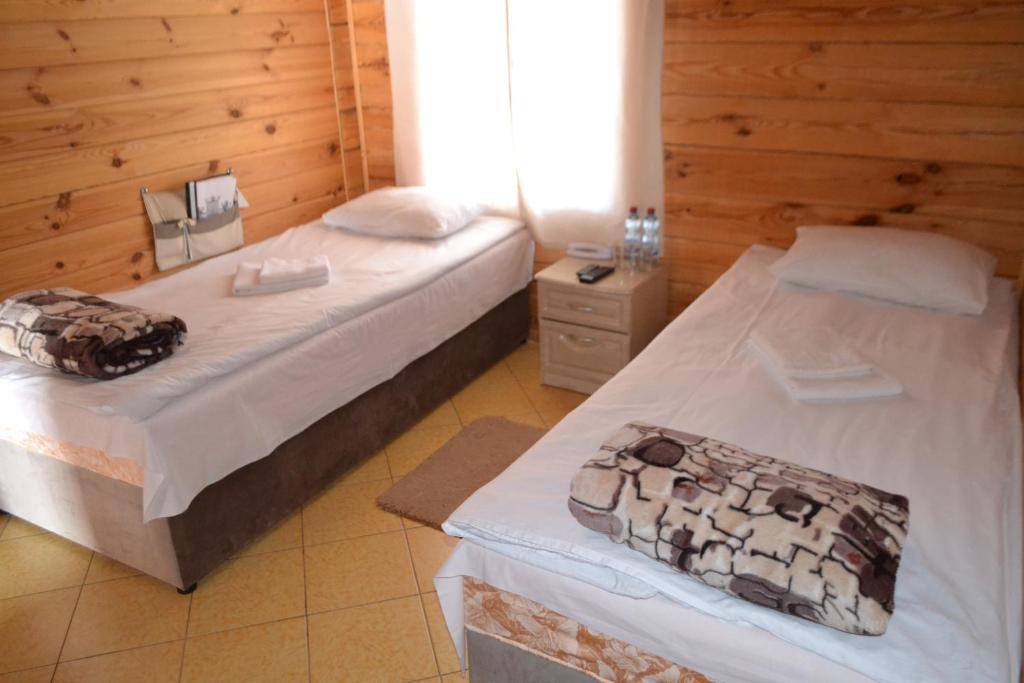 Postel nebo postele na pokoji v ubytování Nester House