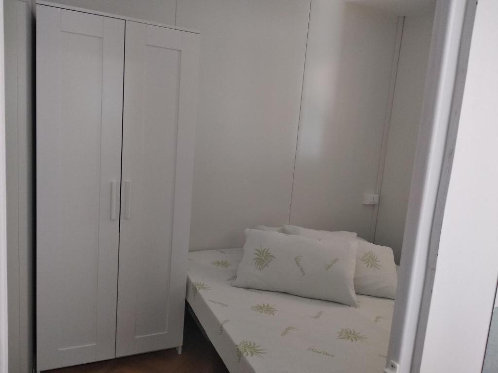 Postel nebo postele na pokoji v ubytování Camping Borghetti